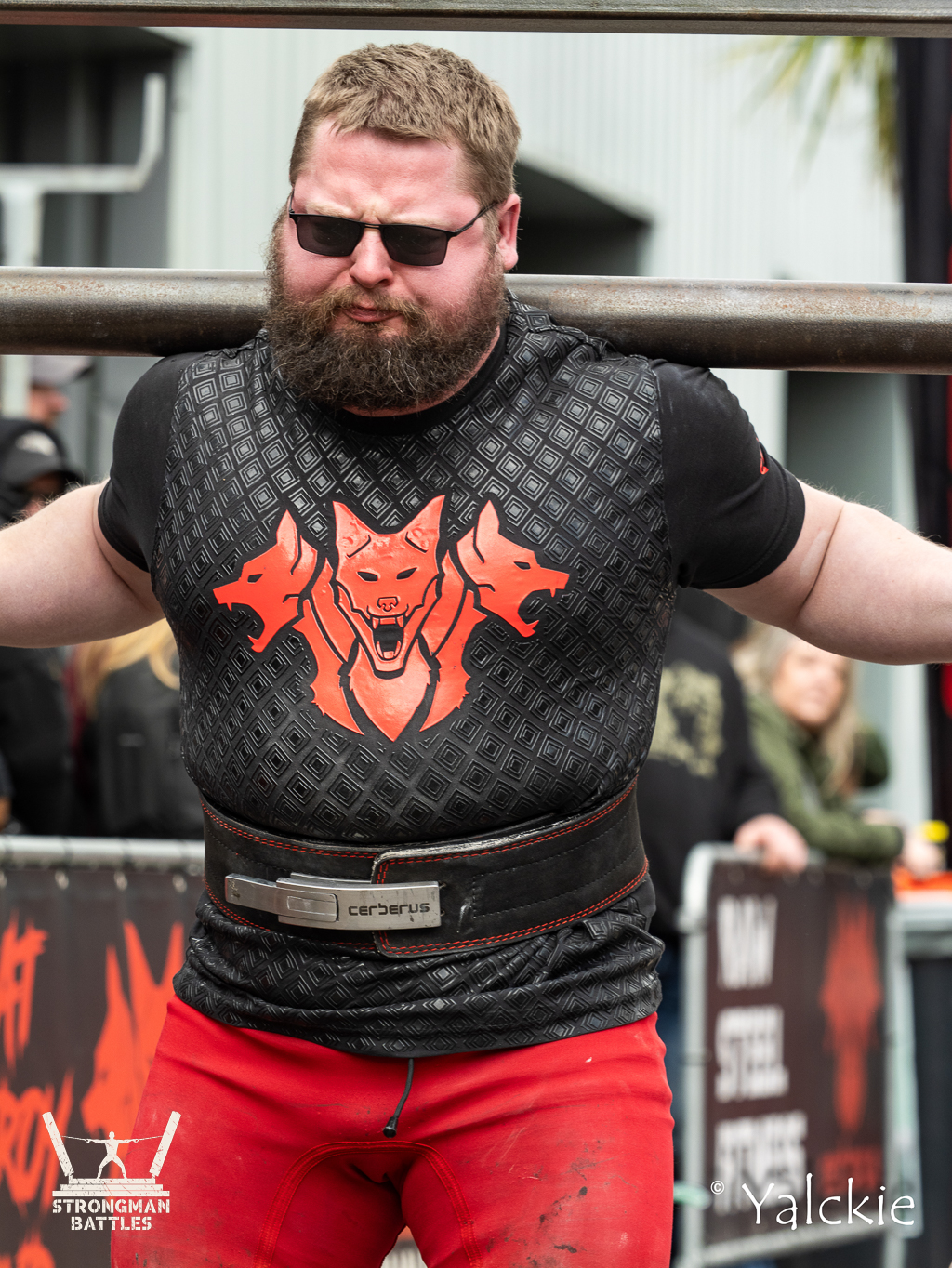 An athlete carrying a yoke at Natural Strongman in 2025