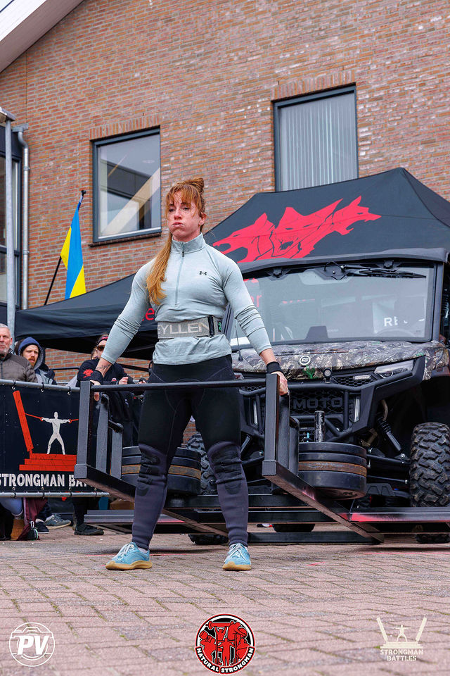 An athlete performing a frame deadlift at Northwest European Strongest in Asperen, March 2026.